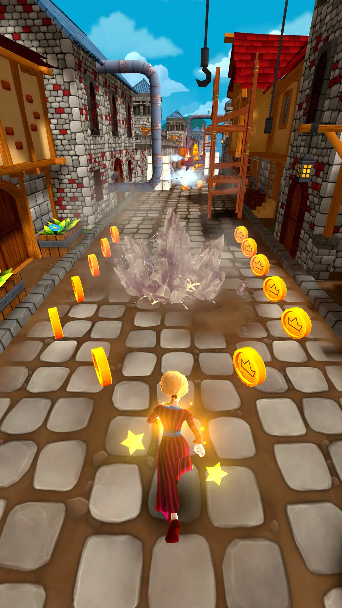 A chaser sprints down a village street toward a cluster of crystals, spell stars trailing as coins line the road